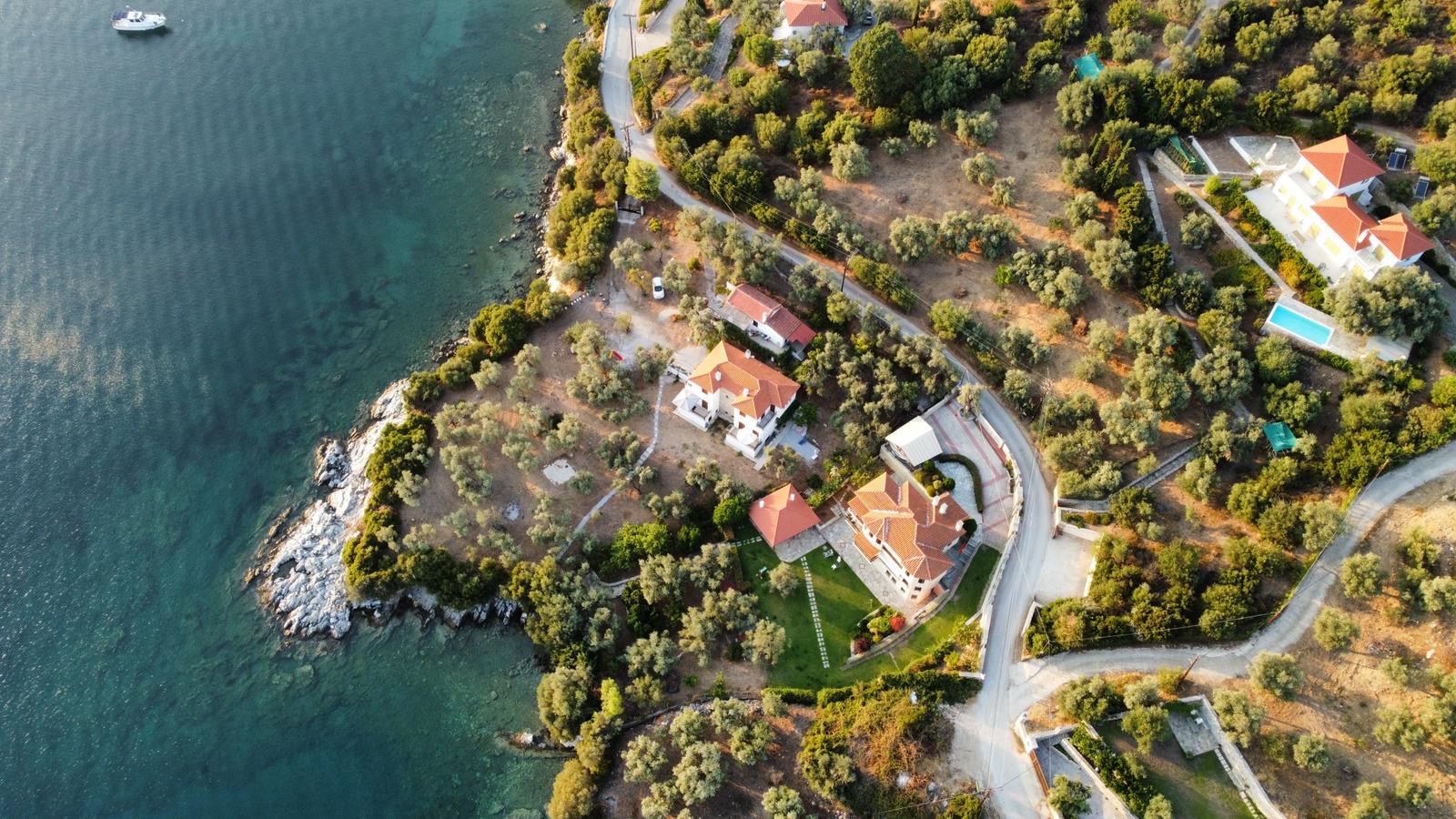 Aerial view of the Lefokastro coastline with Olive Tree Bay highlighted