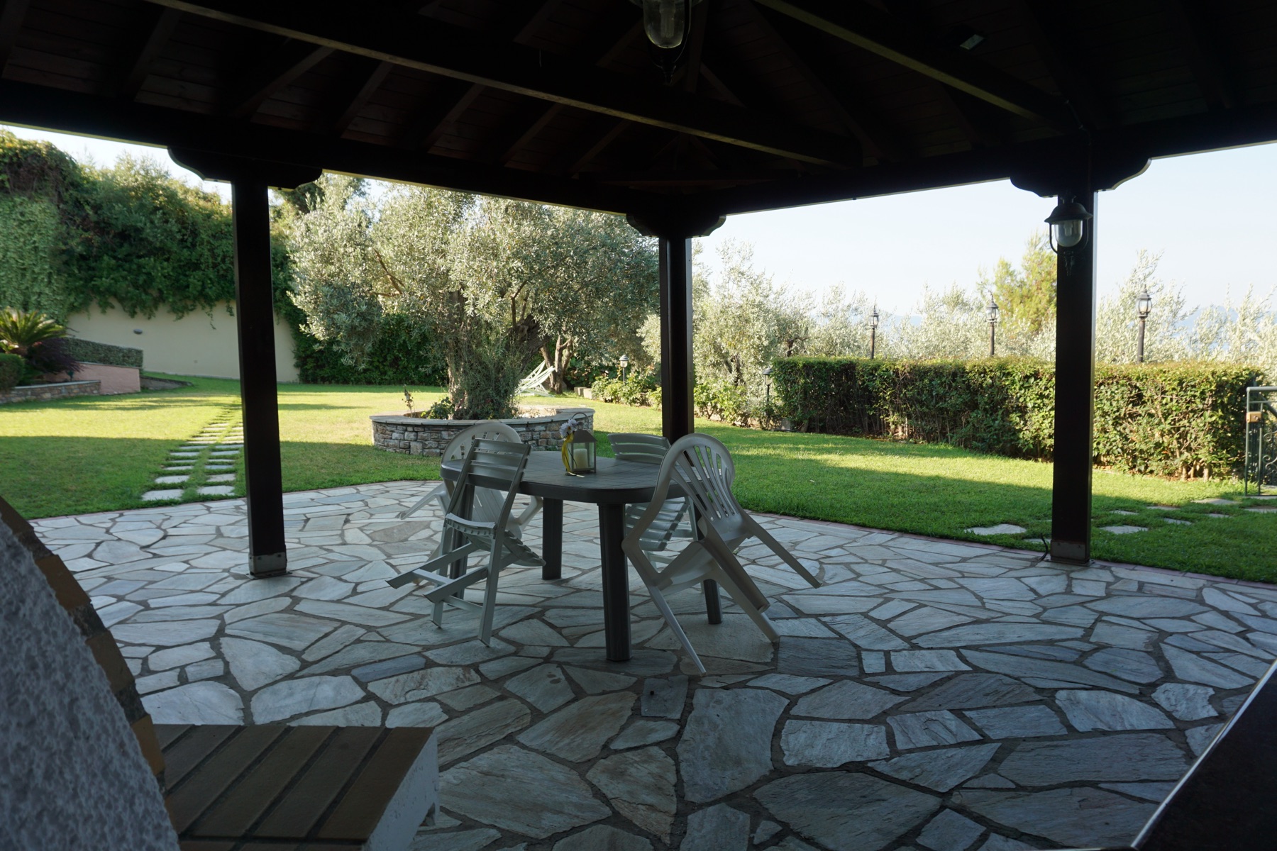 Stone pergola overlooking the garden